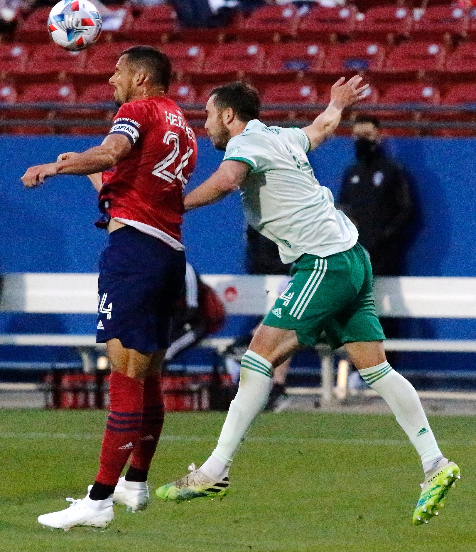 FC Dallas defender Matt Hedges (24) gets a header in front of Colorado Rapids defender Danny...