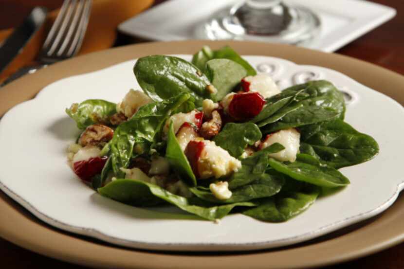 Use pepper jelly to brighten up the flavors of a winter spinach salad.