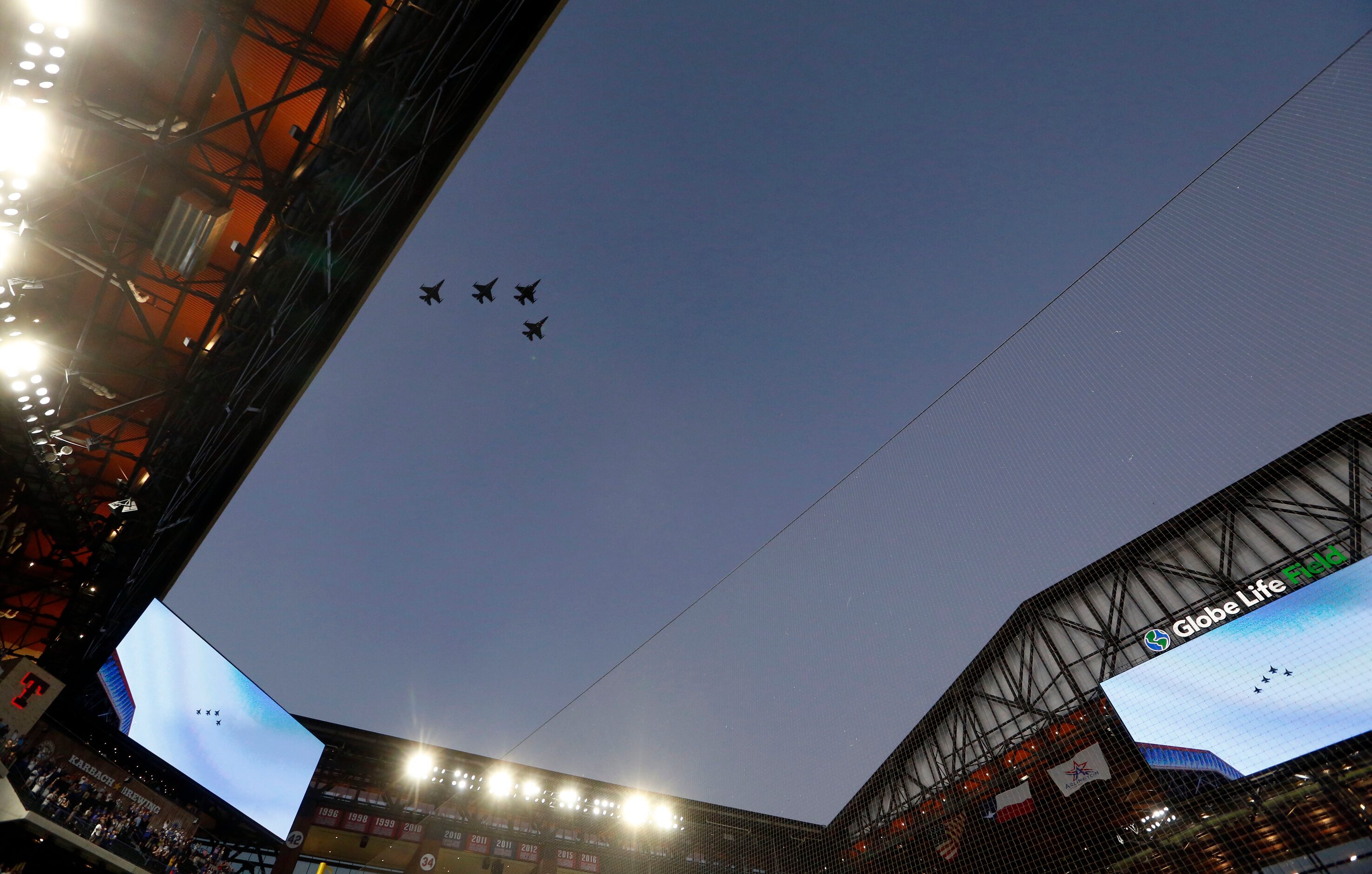 A flyover the ballpark as the national anthem is sung virtually as the Los Angeles Dodgers...