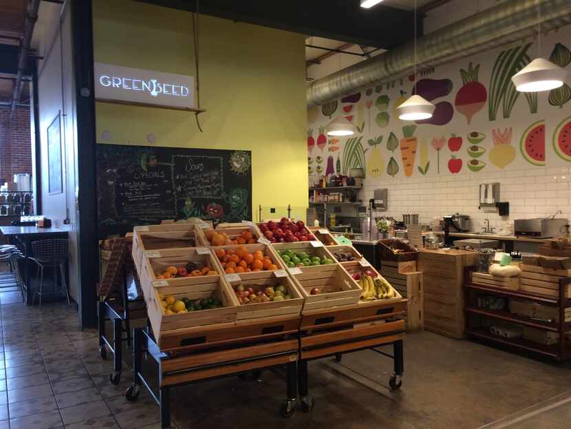 Locals get fresh vegetables and more at RiNo's Denver Central Market.