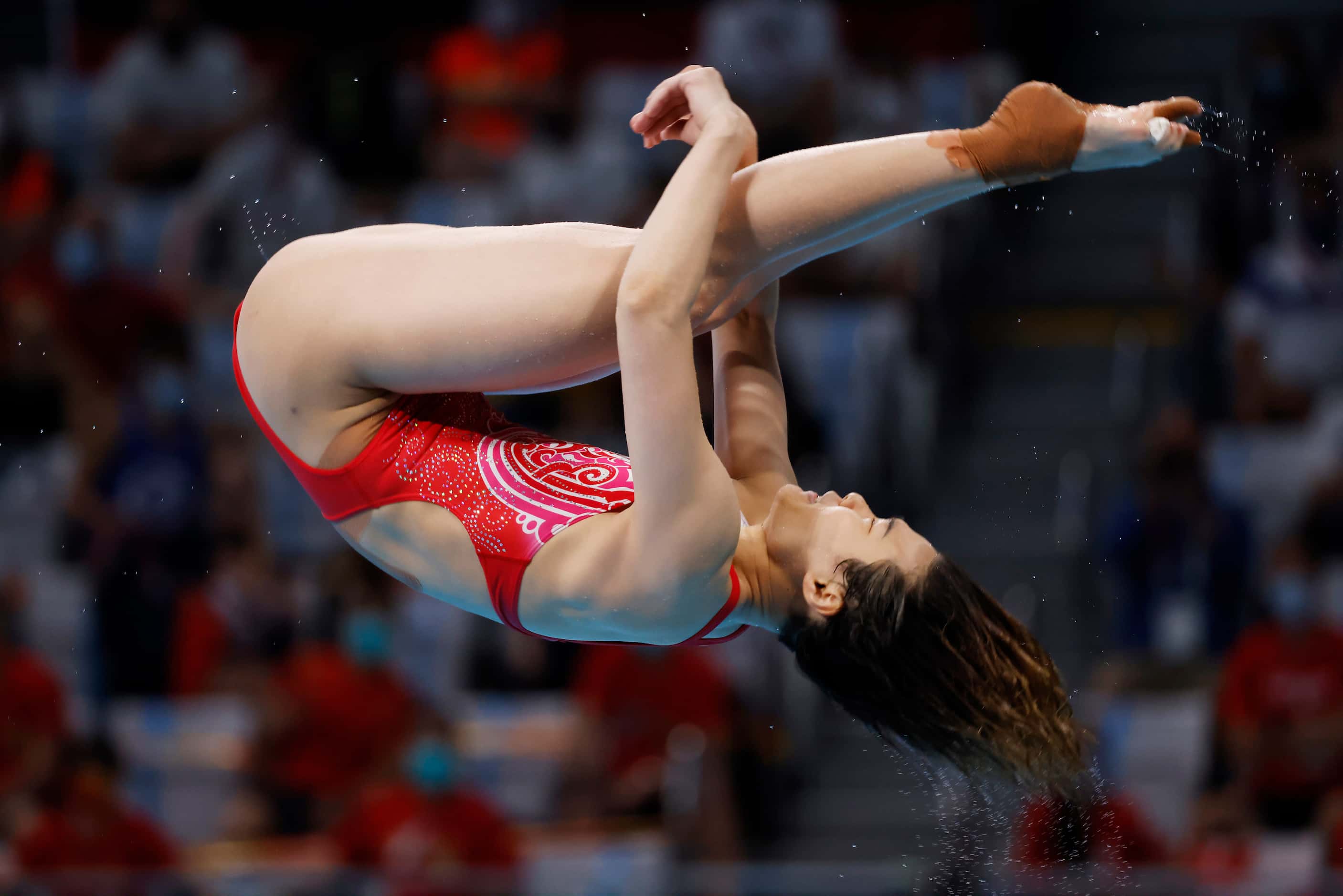 China’s Shi Tingmao dives in the women’s 3 meter springboard final during the postponed 2020...