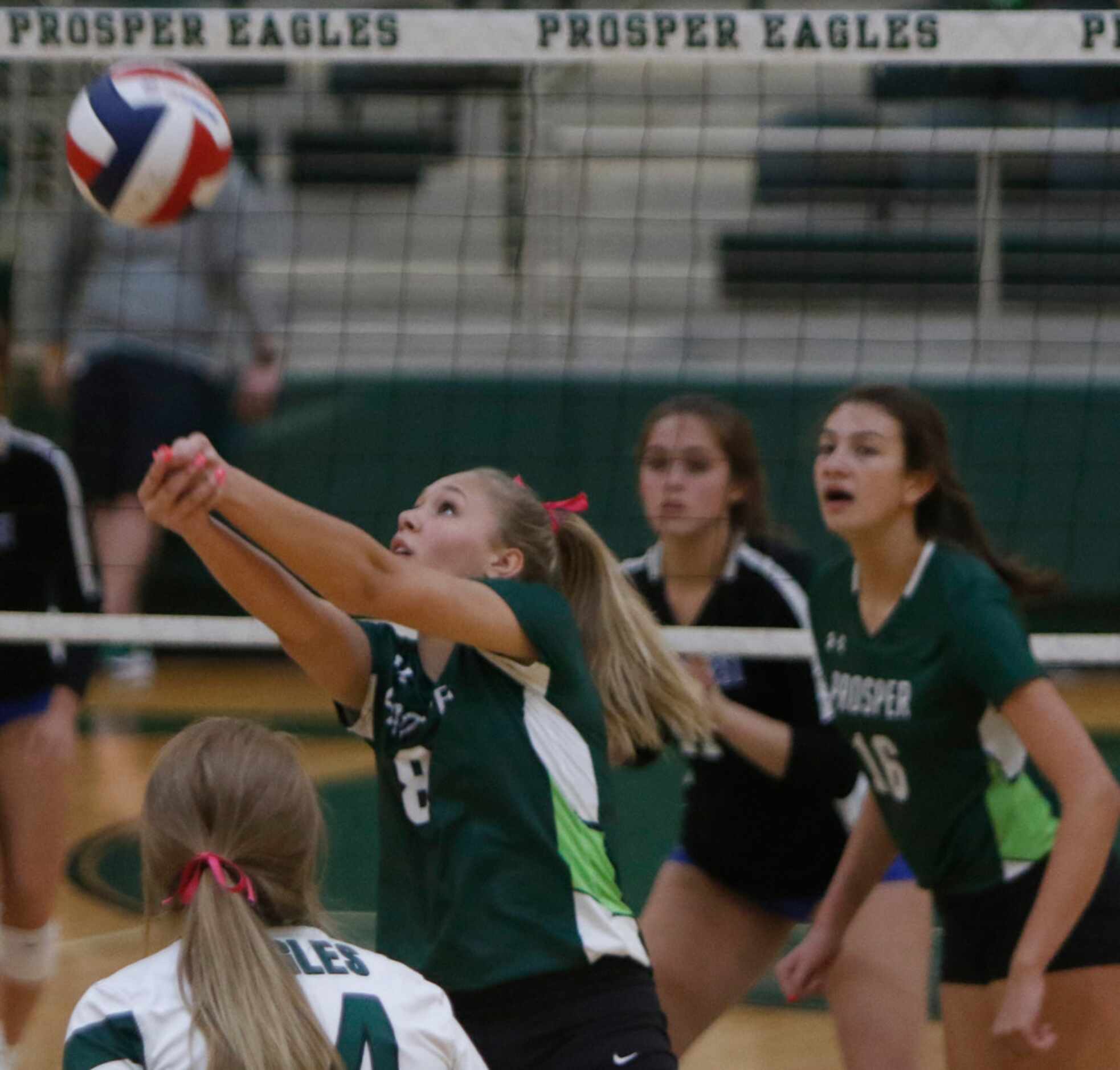 Prosper's Jazzlyn Ford (8) keeps the ball in play during the 2nd game of their match against...