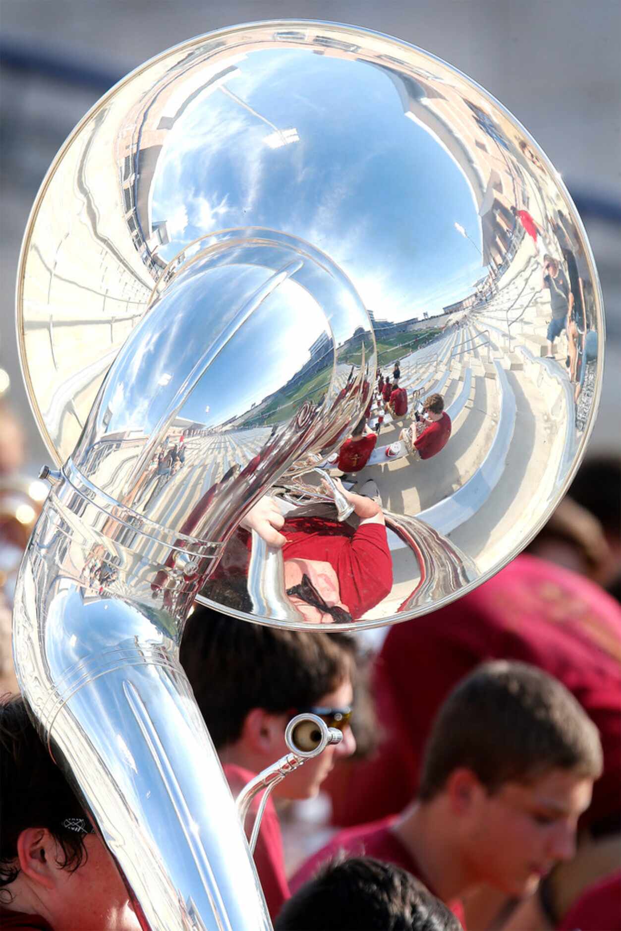 Zachery Joyner, 17, holds his sousaphone while waiting to play with the Lovejoy High School...