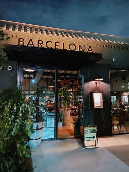 Barcelona Wine Bar is located in a building erected in the 1920s that was originally a tin...