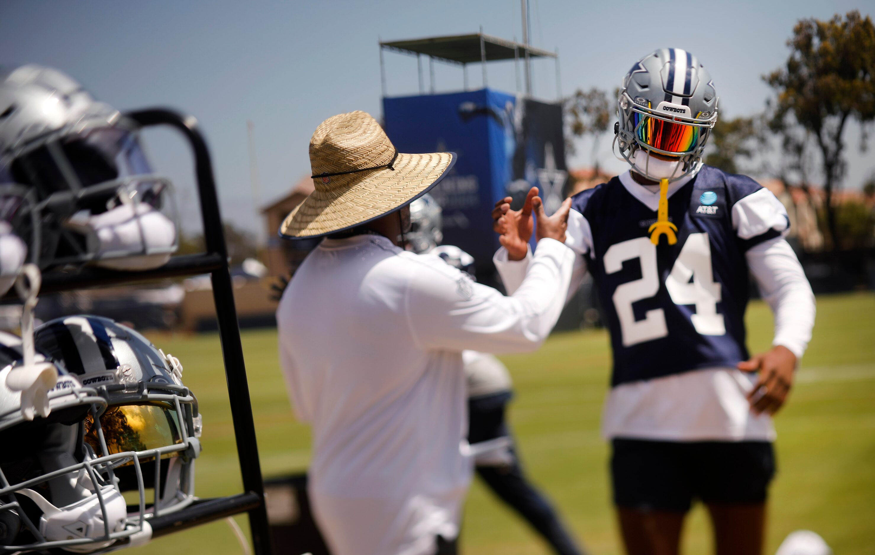 Dallas Cowboys safety Israel Mukuamu (24) is greeted as he comes off the field following ...