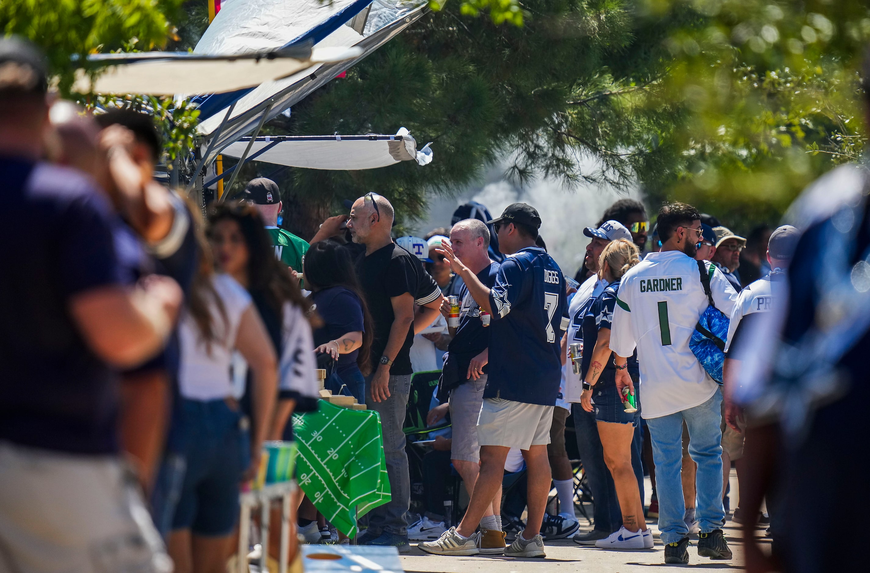 Dallas Cowboys fans tailgate before an NFL football game at AT&T Stadium against the New...