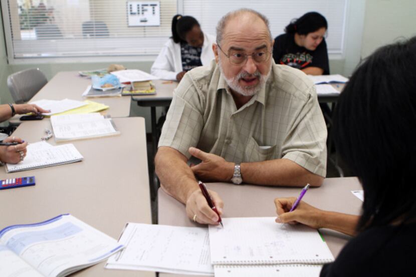 Gabe Barna and other volunteers provide GED study help and other adult education services at...
