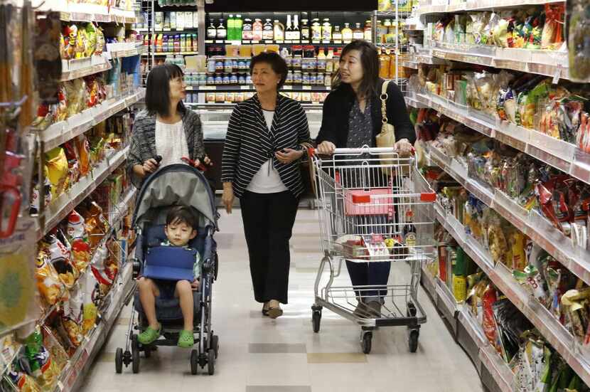 
One shopper calls H Mart, a 70,000-square-foot Korean supermarket at the Shops of Old...