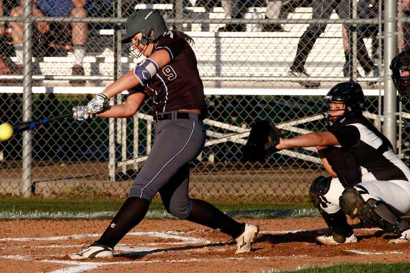 North Forney's Marilyn Rizzato (9) bats against Forney in their high school softball game in...