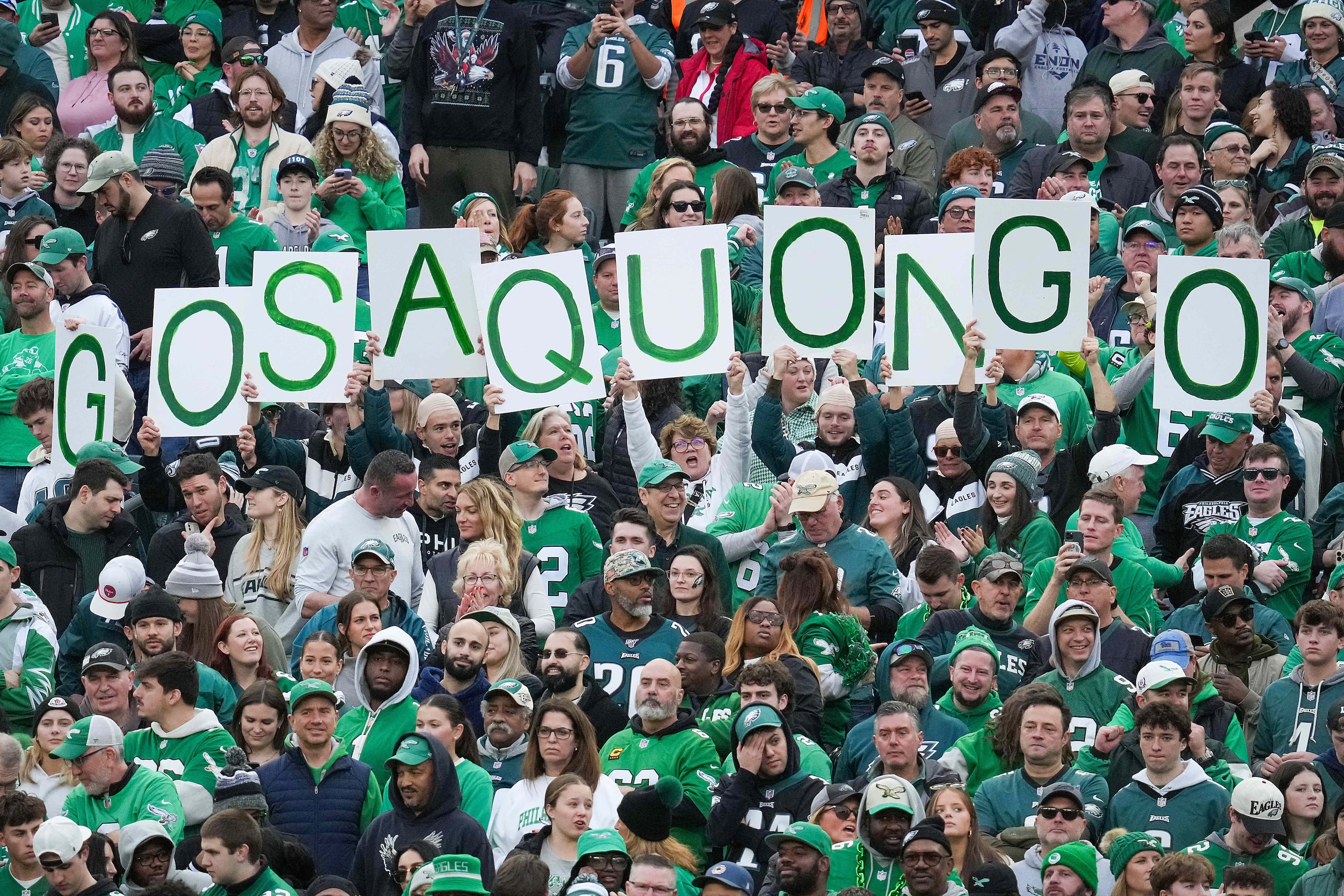 Philadelphia Eagles fans cheer running back Saquon Barkley during the second half of an NFL...