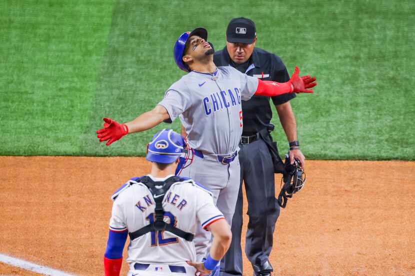 Chicago Cubs' Christopher Morel celebrates hitting a three-run home run as Texas Rangers...