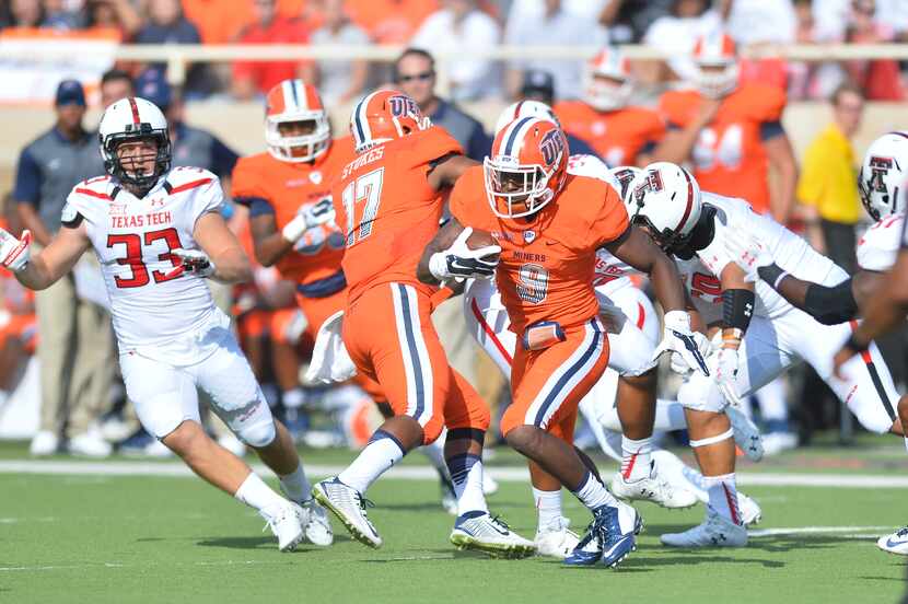 LUBBOCK, TX - SEPTEMBER 12: Jaquan White #9 of the UTEP Miners runs the ball against the...