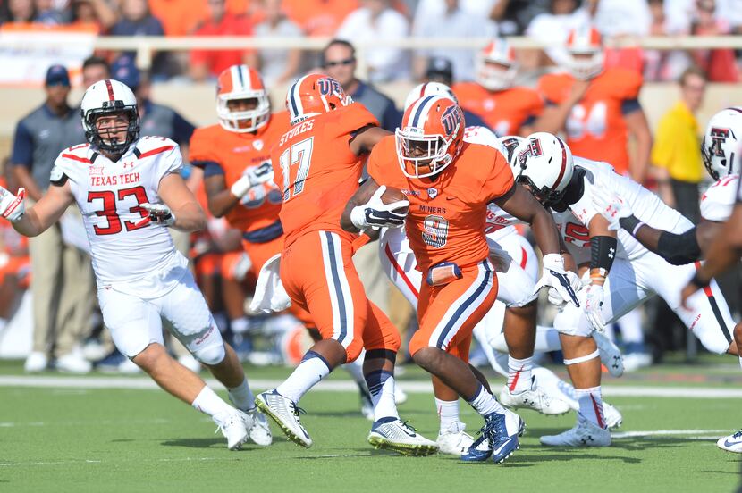 LUBBOCK, TX - SEPTEMBER 12: Jaquan White #9 of the UTEP Miners runs the ball against the...