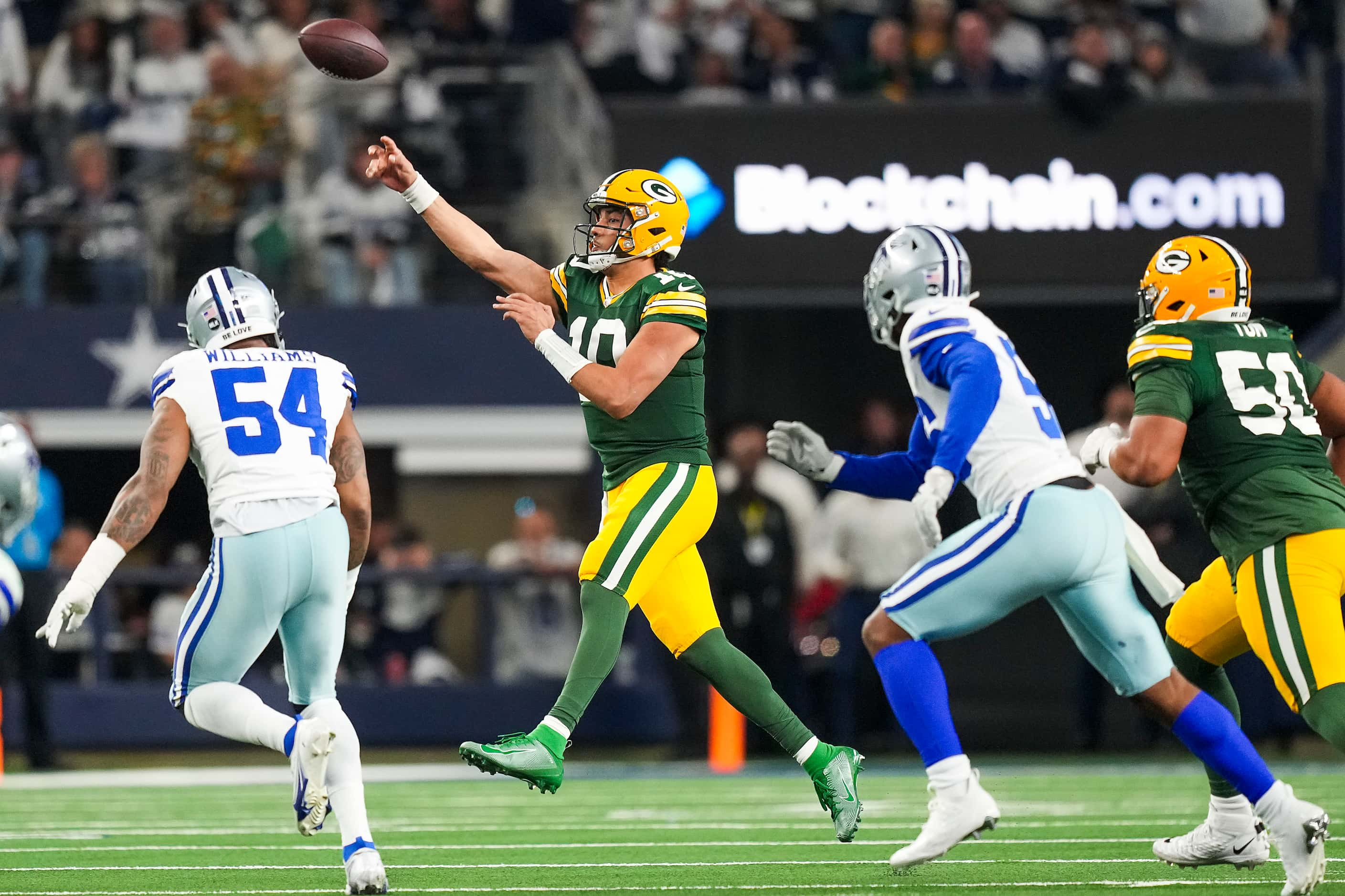 Green Bay Packers quarterback Jordan Love (10) throws a pass during the first half of an NFL...