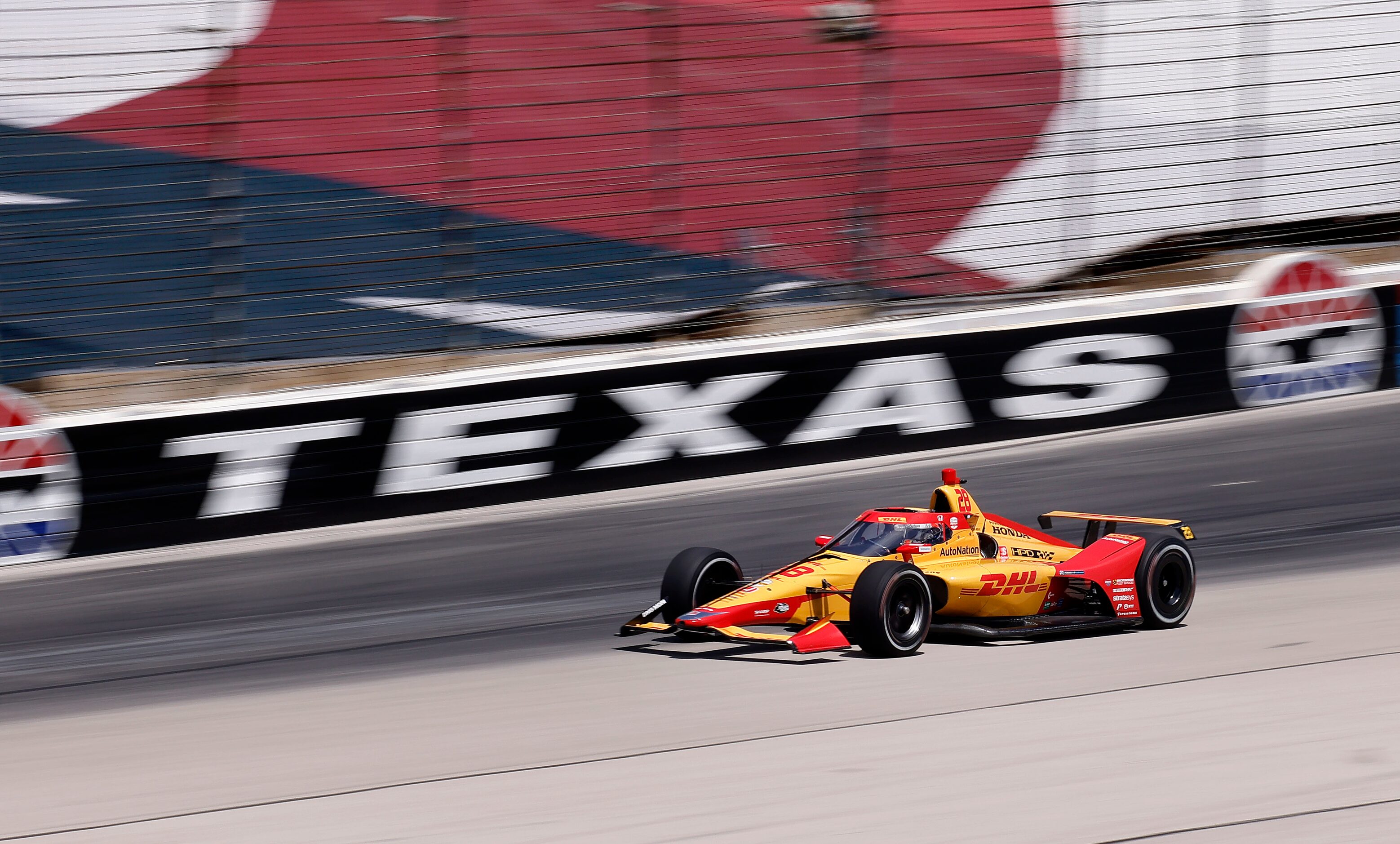 Indy Car driver Ryan Hunter-Reay speeds out of turn 4 as he practices for the upcoming NTT...