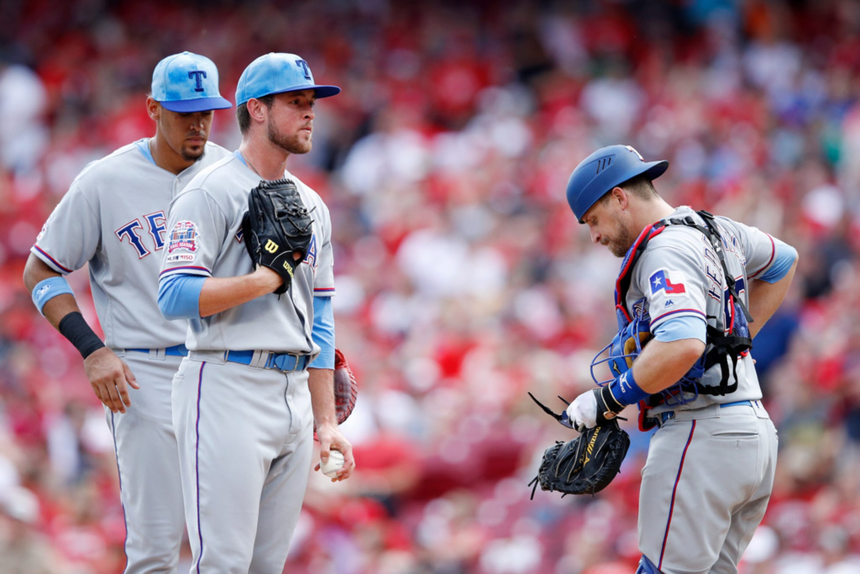 CINCINNATI, OH - JUNE 16: Jeffrey Springs #54 of the Texas Rangers reacts before being...