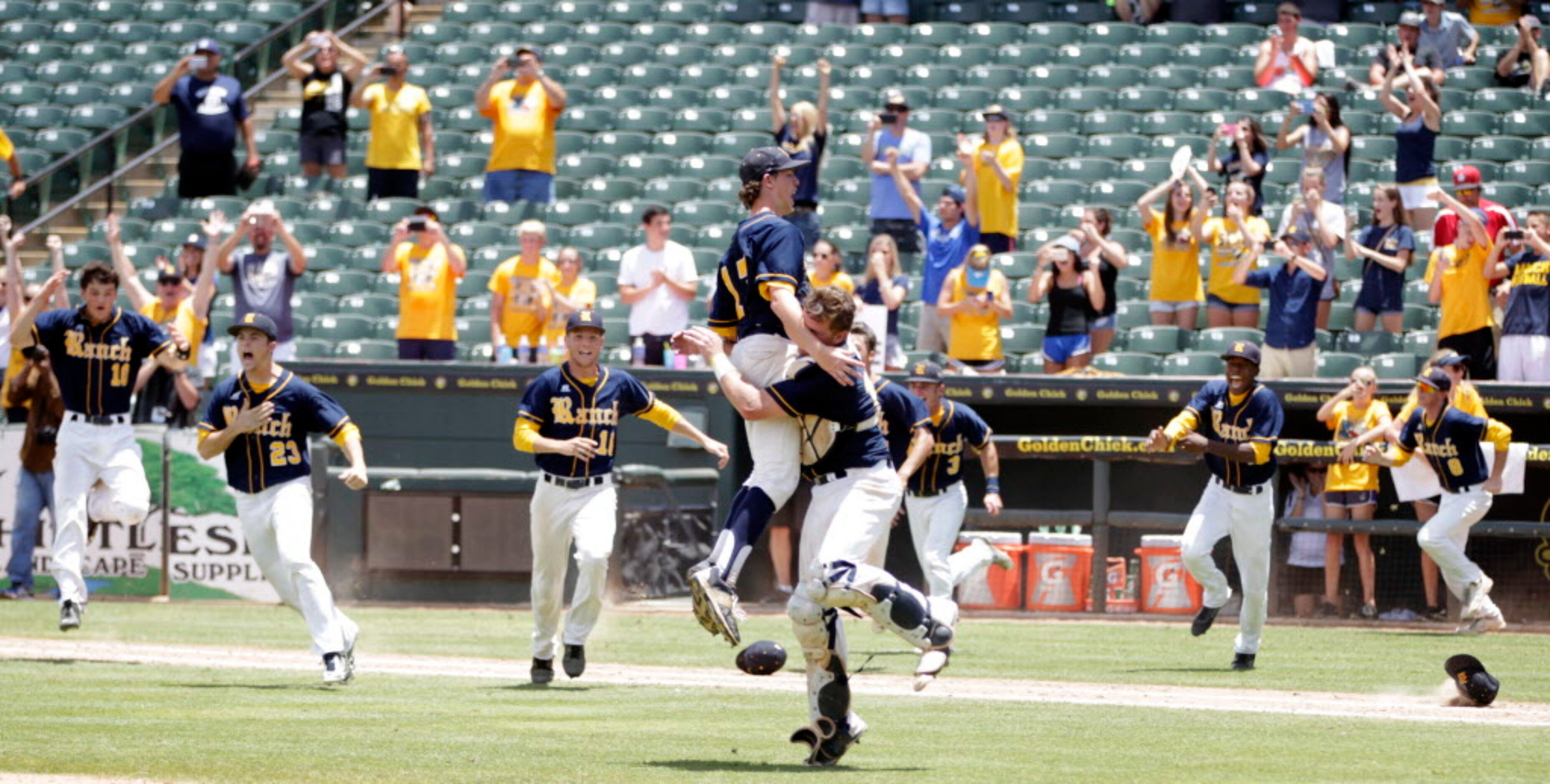 Cypress Ranch's Tyler Bielamowicz (17) and Marshall Skinner (13) celebrate as their...