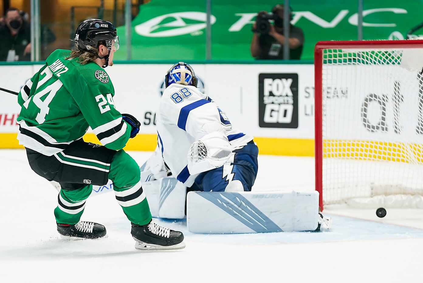 Dallas Stars left wing Roope Hintz (24) puts the puck past Tampa Bay Lightning goaltender...