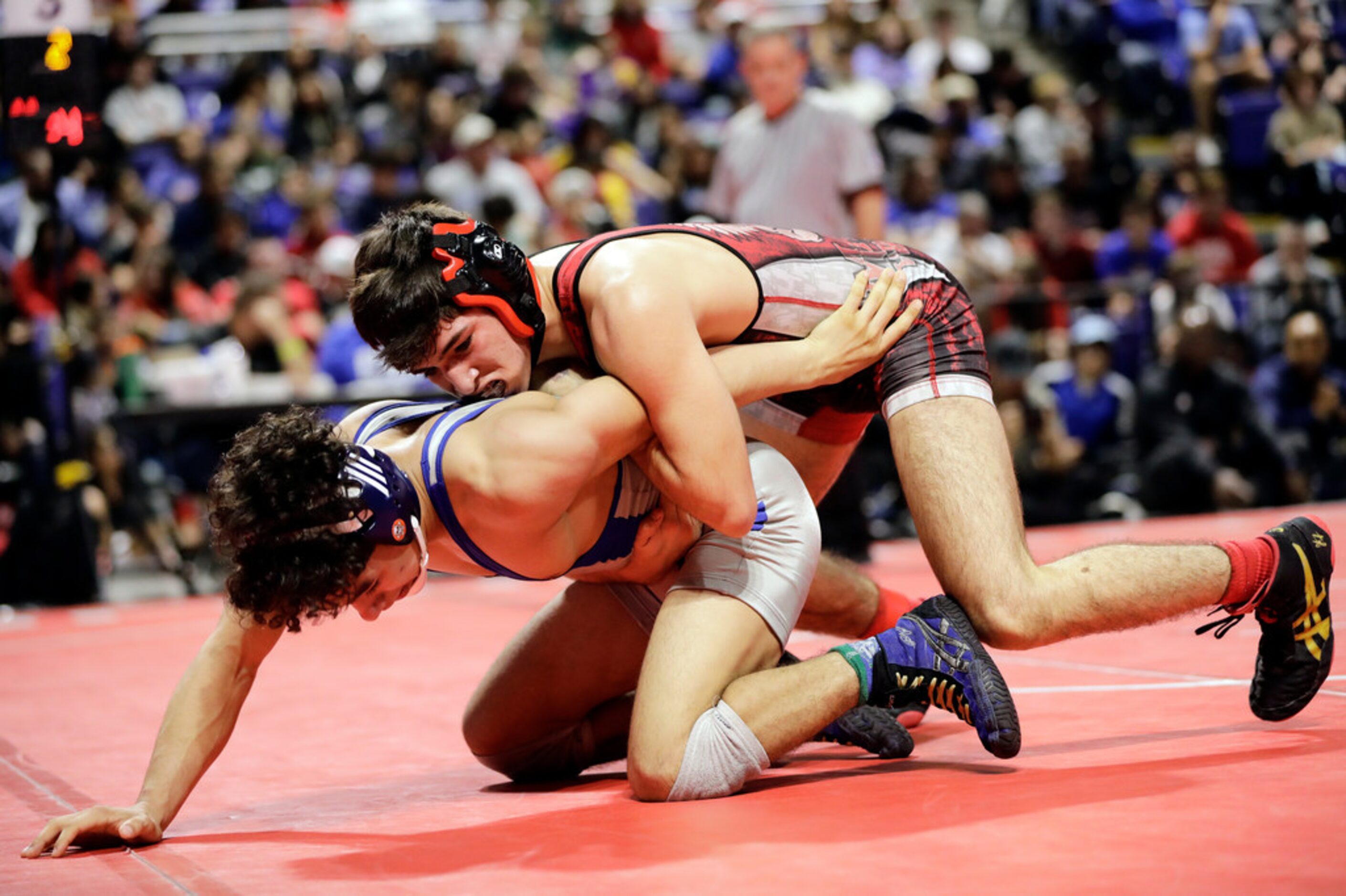 Dominic Chavez of Arlington Martin wrestles during the UIL Texas State Wrestling...