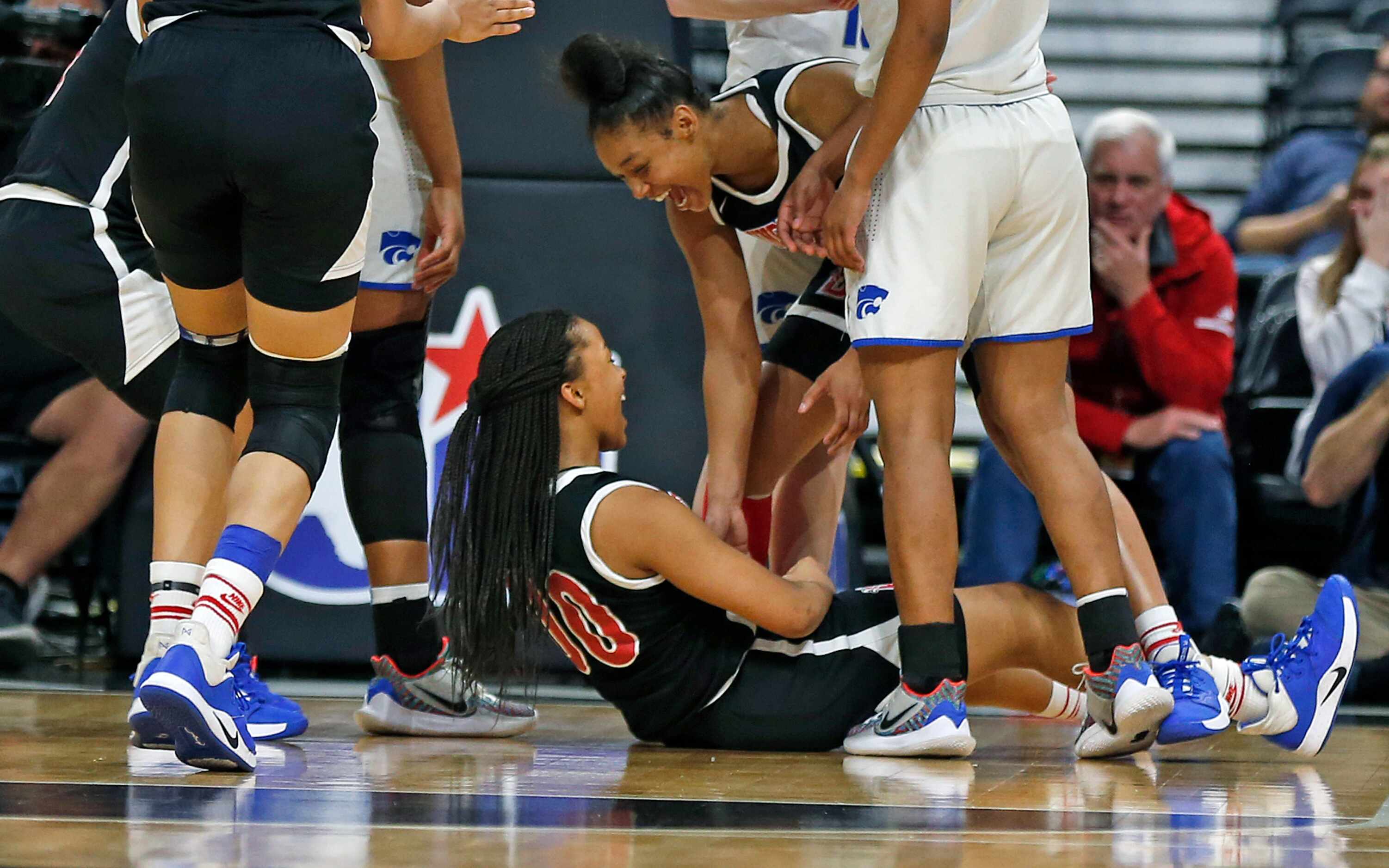 Duncanville guard Hope LeMelle #00 celebrates an and one in a 6A final on  Saturday, March...