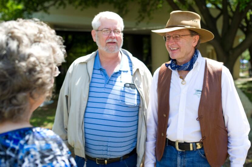 Baylor transplant chief Goran Klintmalm (right) chats with liver recipient John Scheffer and...