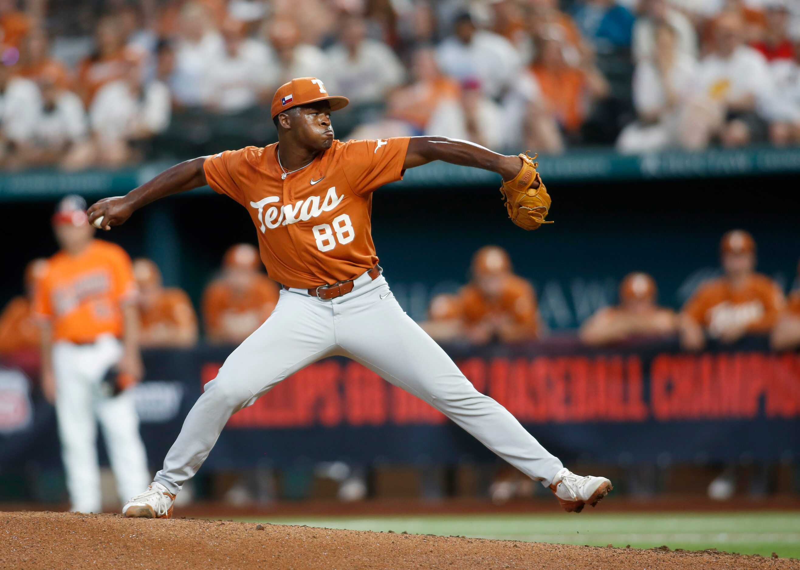 Texas Longhorns pitcher Andre Duplantier ll, (88) delivers a pitch to an Oklahoma State...