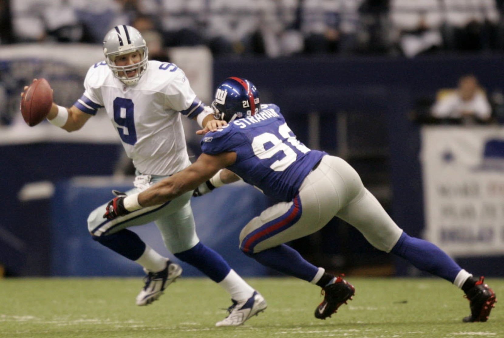 New York Giants Michael Strahan reacts to a sack in week 13 at