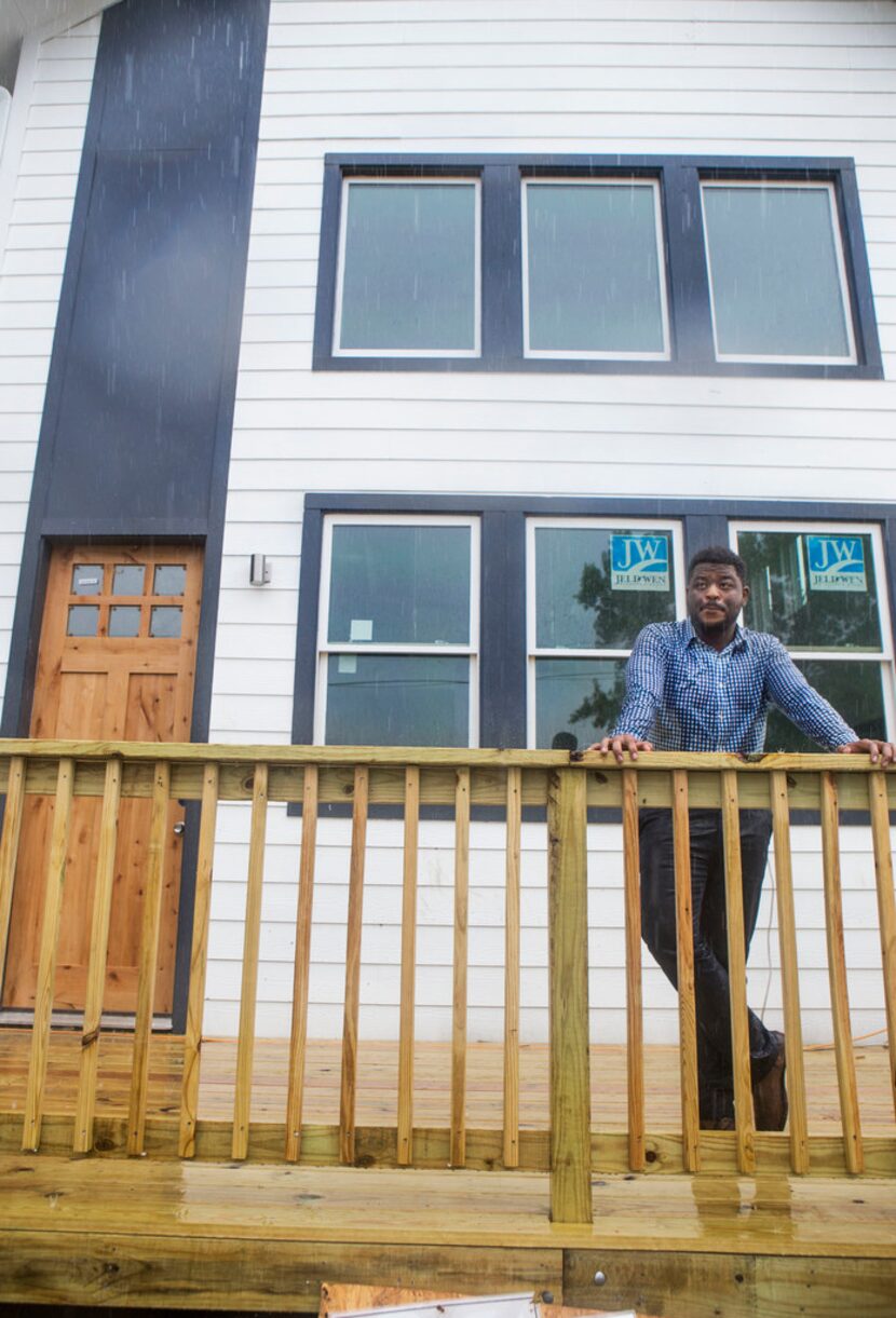 Architect Jay Taylor poses for a photo in front of a home he built in Oak Cliff in Dallas on...