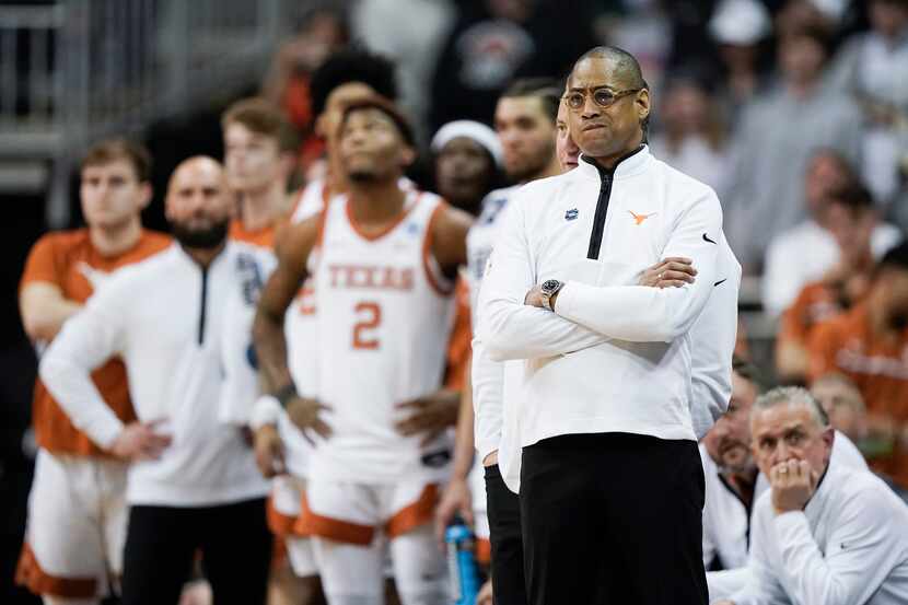 Texas head coach Rodney Terry watches during their loss against Miami in an Elite 8 college...