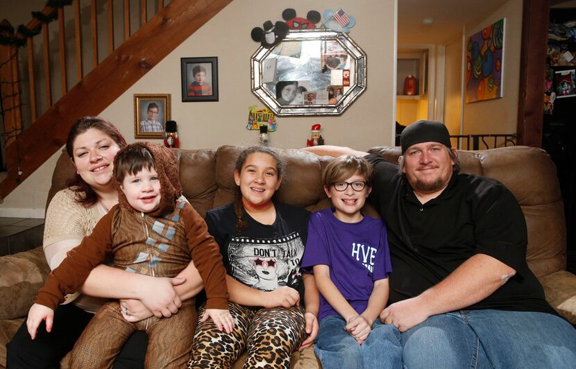 From left: Tommie Ogletree holding Zachary Ogletree, 3; Sydney Ogletree, 12; Bradley...