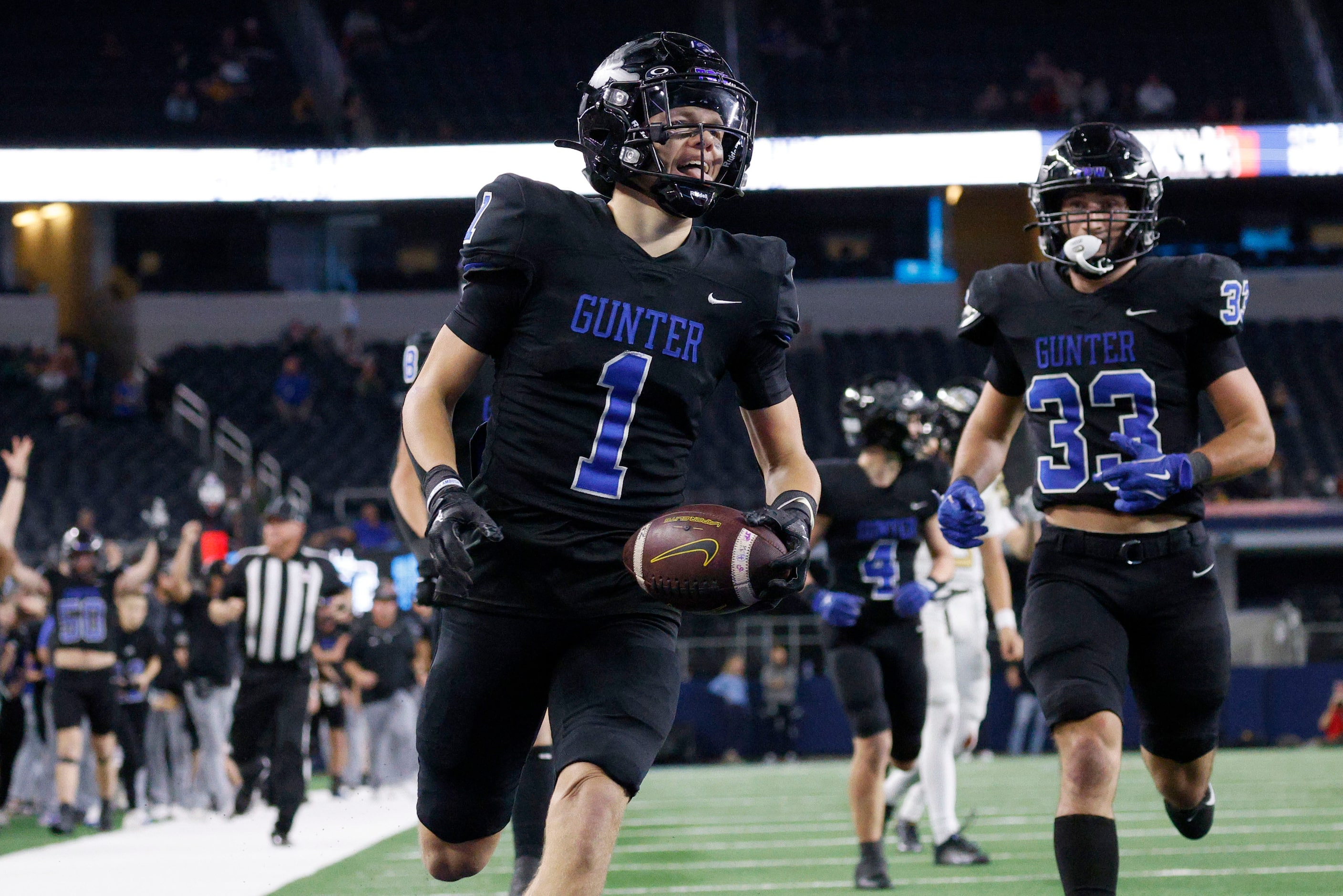 Gunter's Brock Boddie (1) intercepts a pass intended for Woodville's Kevunte Mcdaniel (4)...