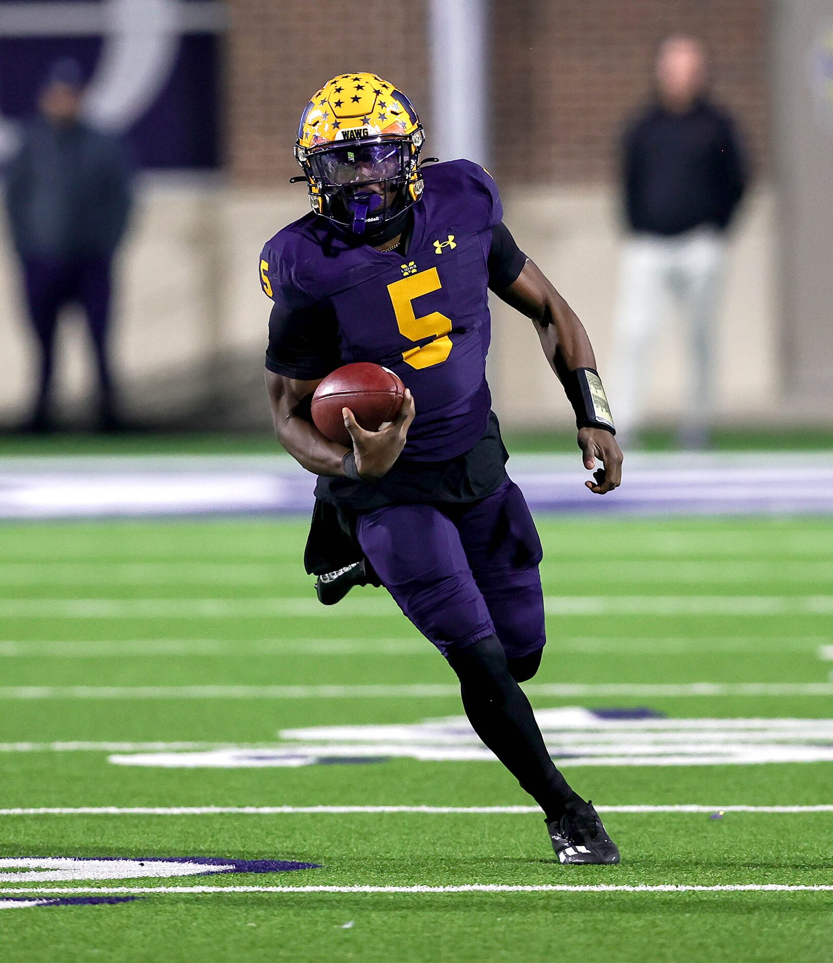 McKinney quarterback Godspower Nwawuihe finds room to run against Prosper during the first...