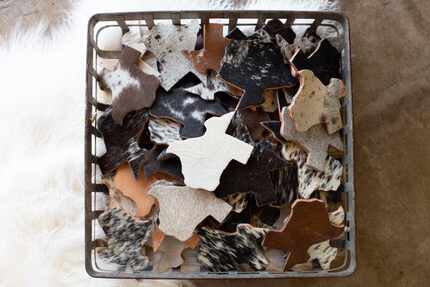 Coasters from Cowhide Couture of Rockwall sold at the Texas Goods Co. opening in late August...