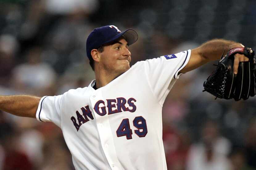 Texas Rangers pitcher (#49) Chris Young pitches against the Seattle Mariners during the 4th...