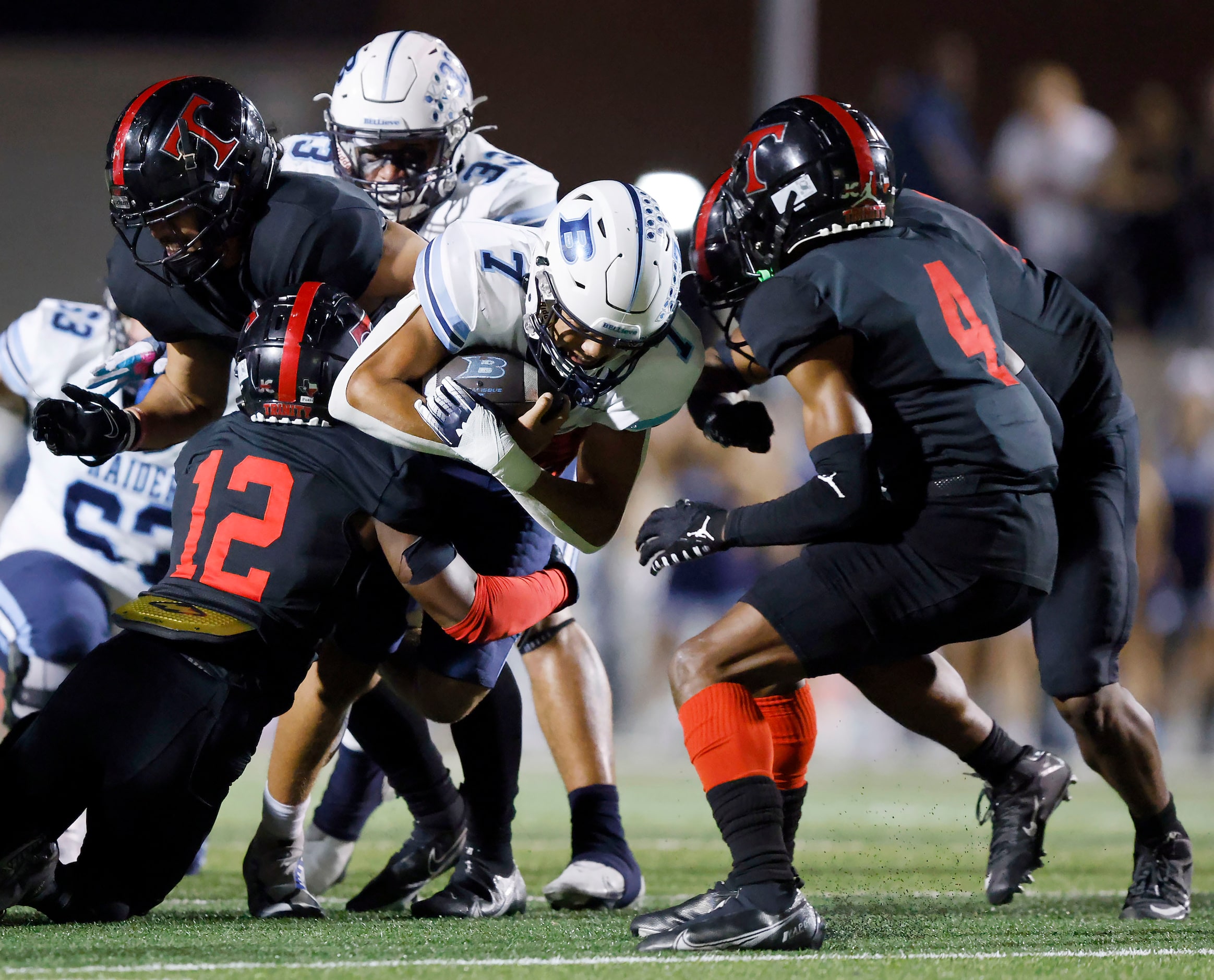 Hurst L.D. Bell quarterback Maddox Olatunde (7) picks up the first down on a fourth down...