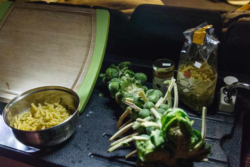 A meal of pasta  and Brussels sprouts was prepared from the back of the Jucy Champ.