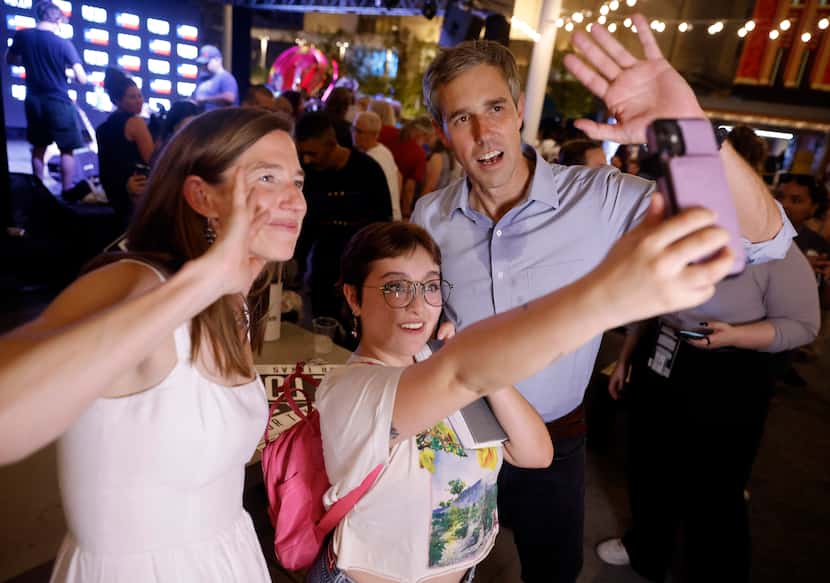 Democratic gubernatorial challenger Beto O'Rourke (right) and his wife Amy (left) record a...