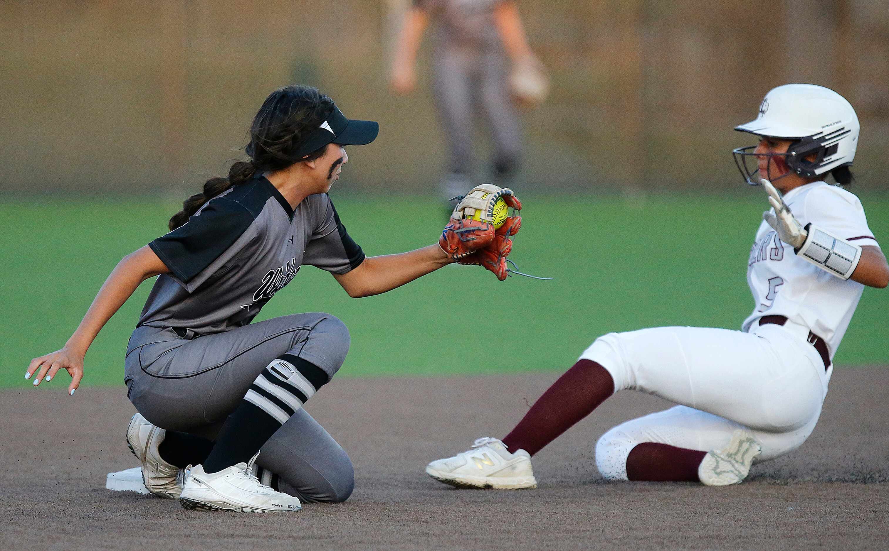 Denton Guyer High School shortstop Aubriella Martinez (12) was late with the tag on...