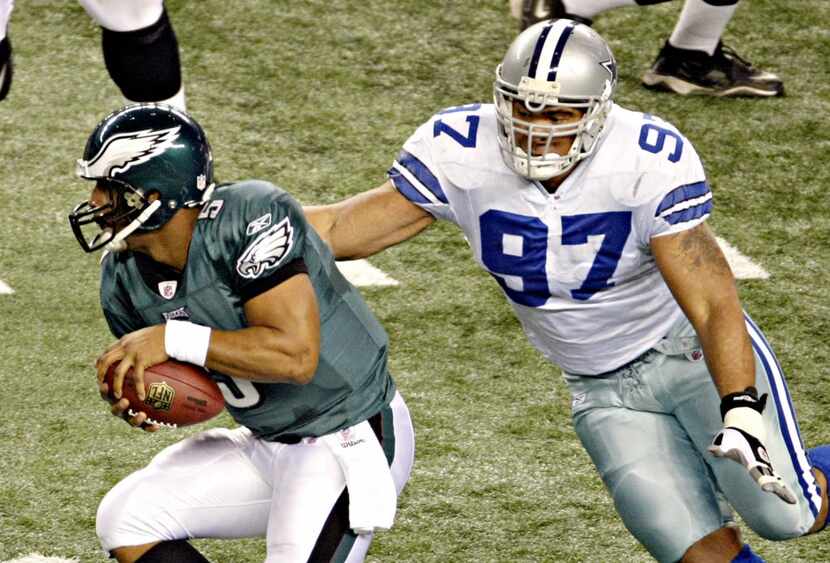01/09/2010 -- Dallas Cowboys defensive end Jason Hatcher (97) chases after Philadelphia...