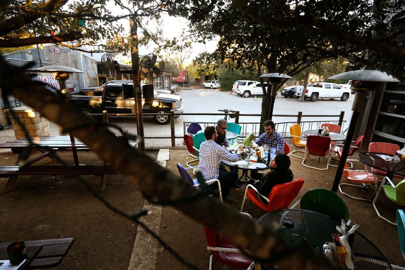 The patio looking into the parking lot of Katy Trail Ice House in Dallas on November 29,...