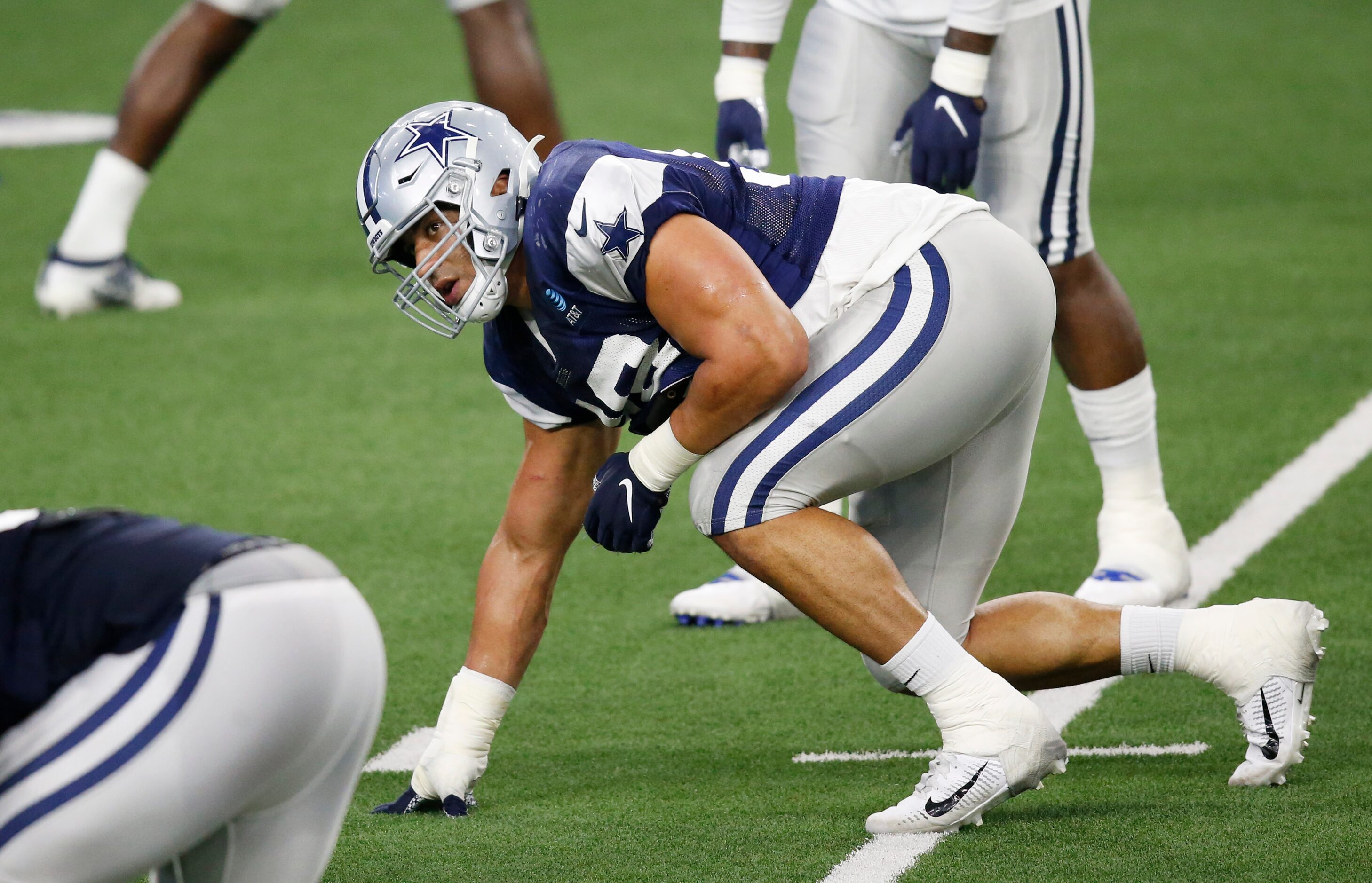 Dallas Cowboys defensive end Tyrone Crawford (98) before the snap during training camp at...