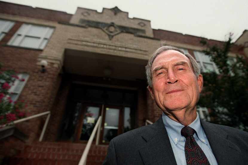 Former Plano ISD Superintendent Dr. H. Wayne Hendrick stands on the front steps of the old...