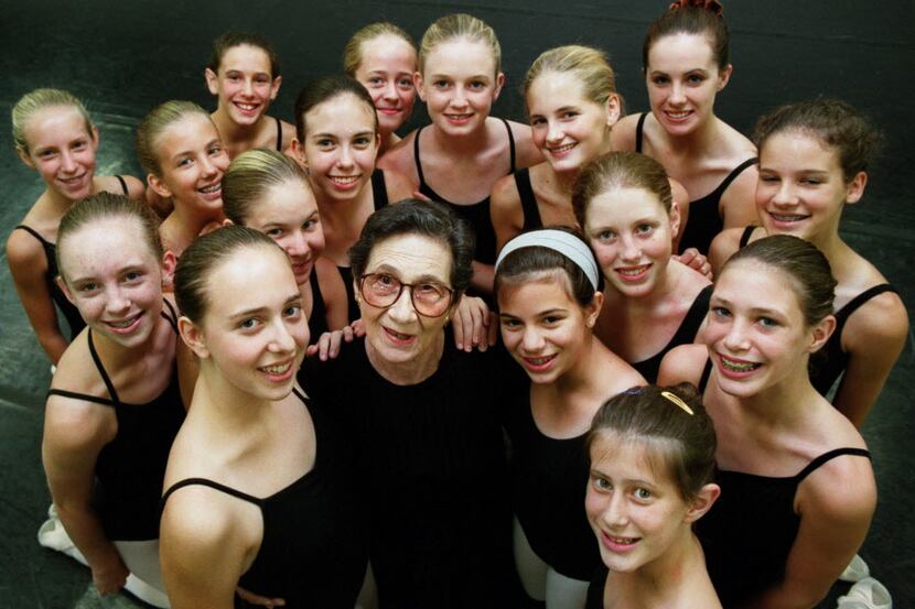 Photograph taken in 2000 of Denise Brown (center) with a class of girls she has instructed...