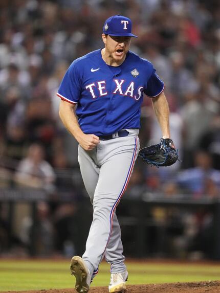 Texas Rangers relief pitcher Josh Sborz (66) reacts after striking out Arizona Diamondbacks’...
