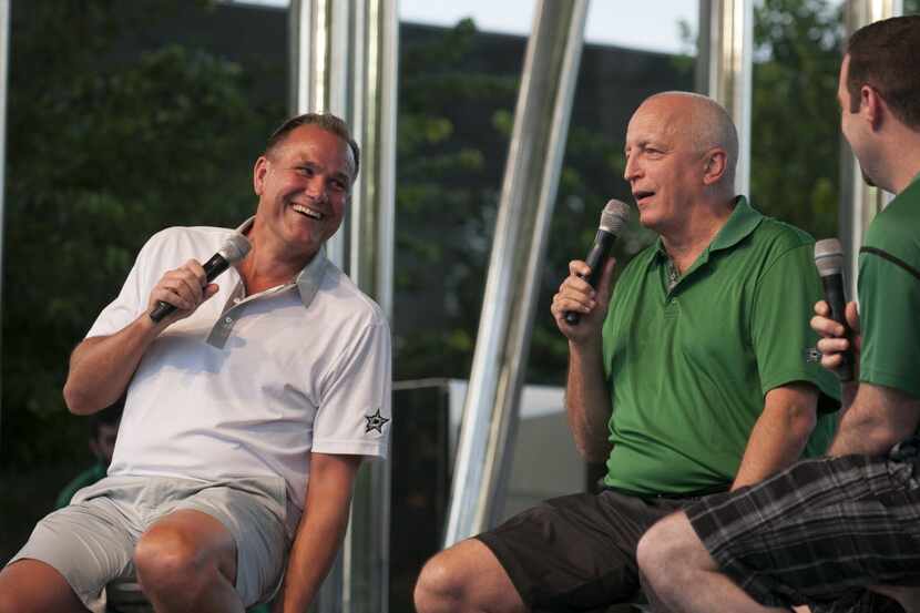 Daryl "Razor" Reaugh, left, and Dave Strader talk about the upcoming hockey season to people...