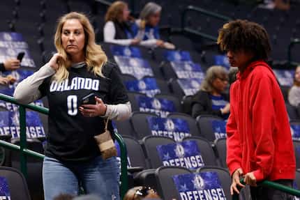 Jennifer Black, mother of Orlando Magic guard Anthony Black, walks around the arena with her...