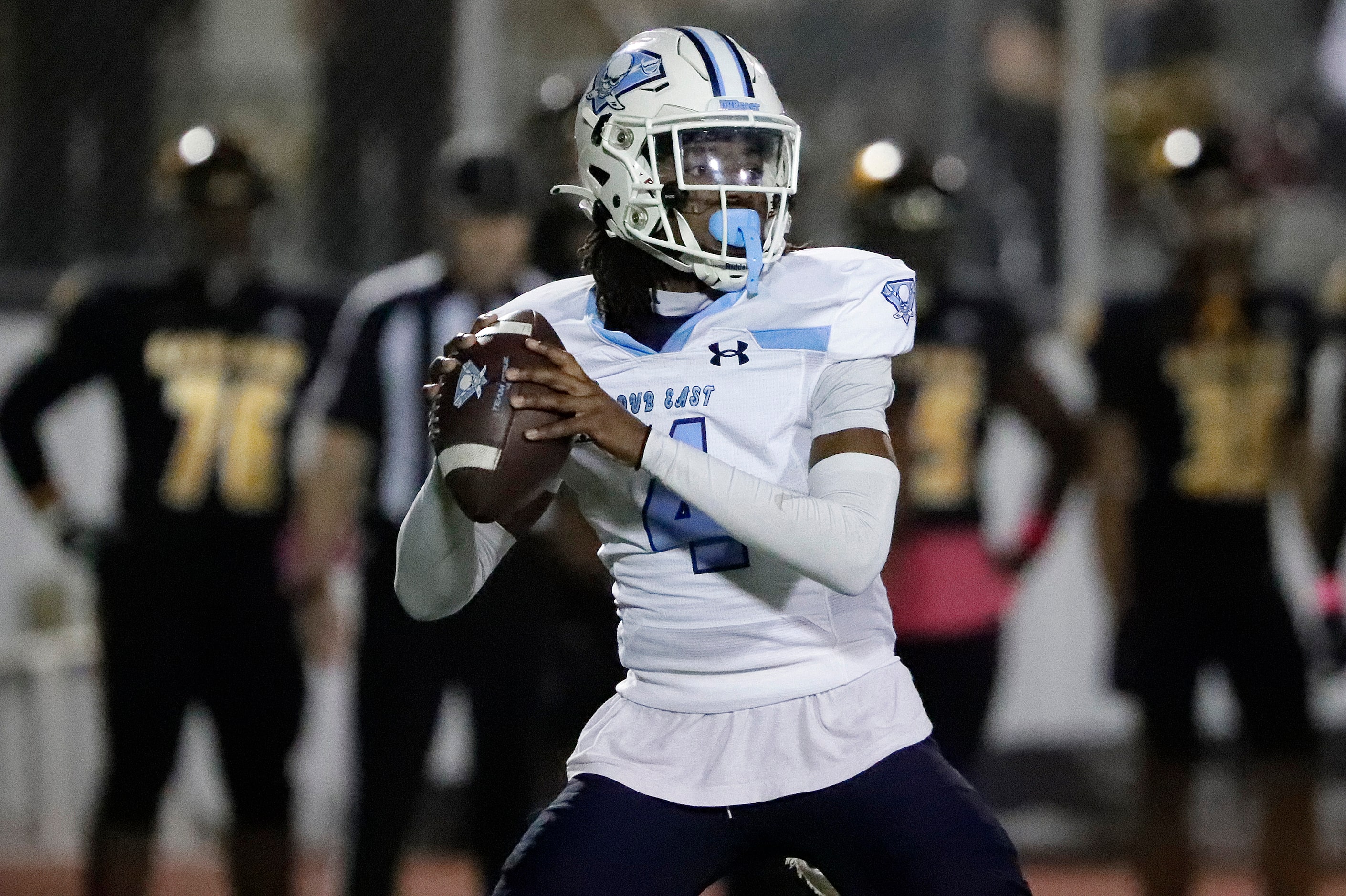 Wylie East High School quarterback Howard Fisher IV (4) prepares to throw during the first...