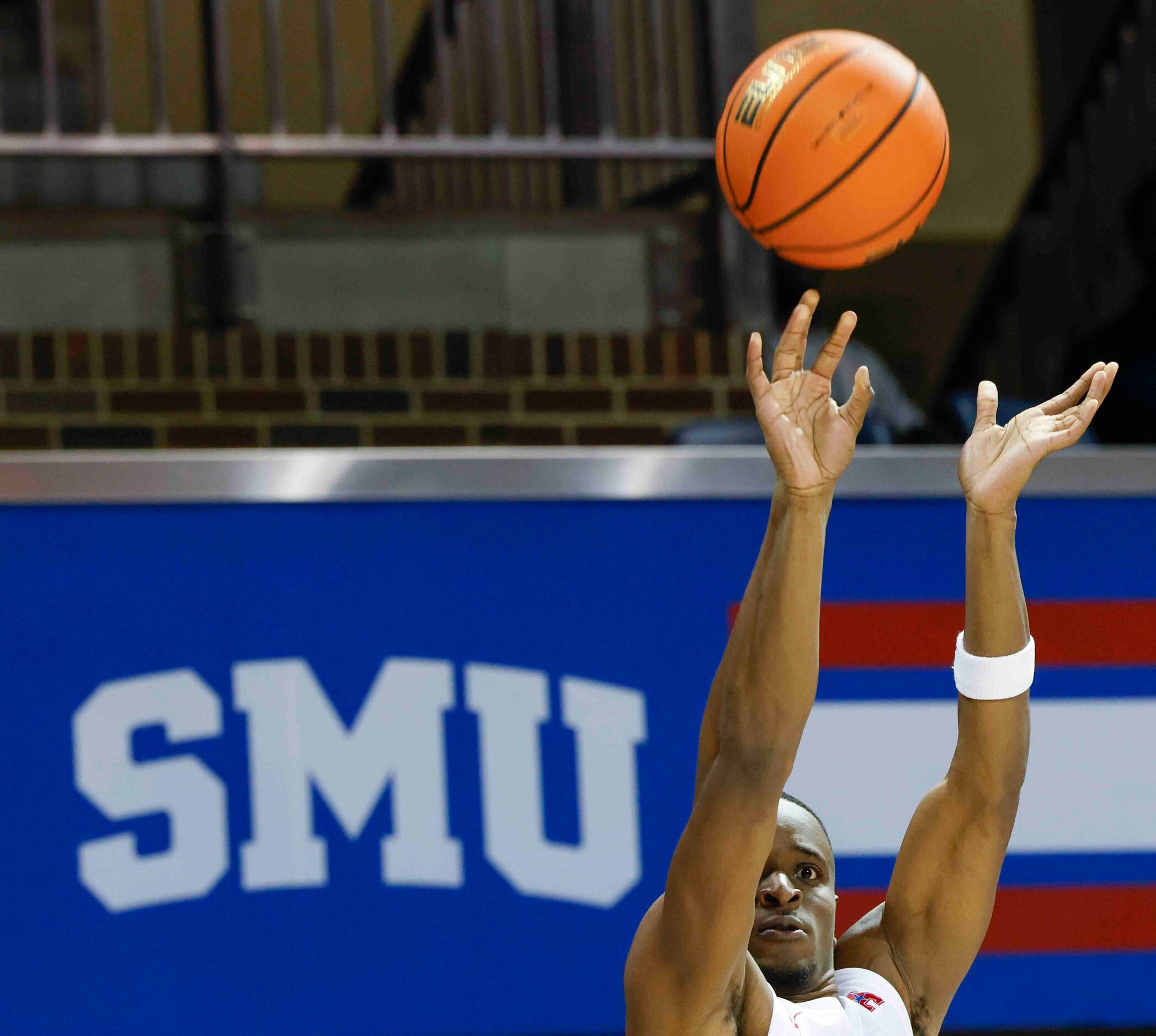 Southern Methodist guard Zach Nutall (10) scores from a three-pointer against Texas A&M-Comm...