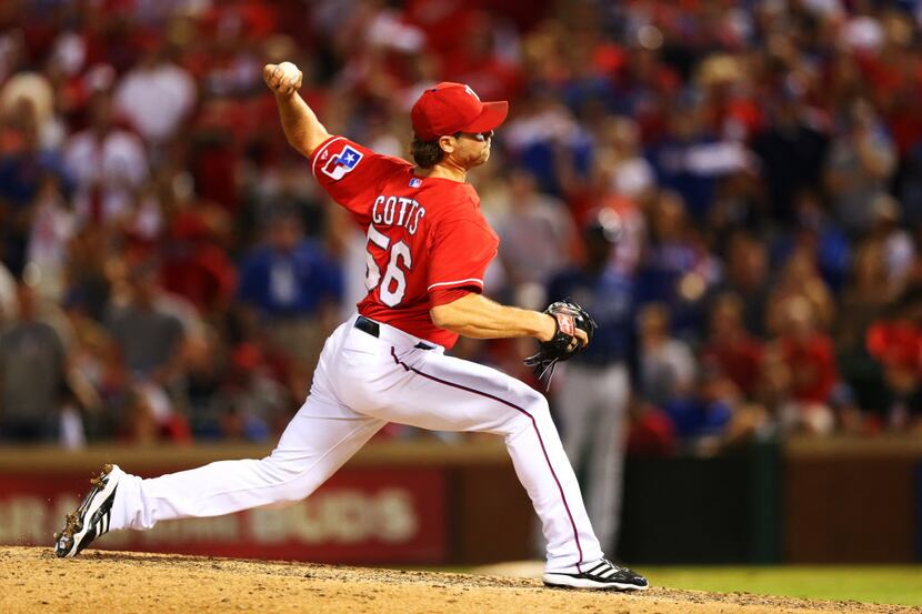 ARLINGTON, TX - SEPTEMBER 30:  Neal Cotts #56 of the Texas Rangers pitches in the eighth...