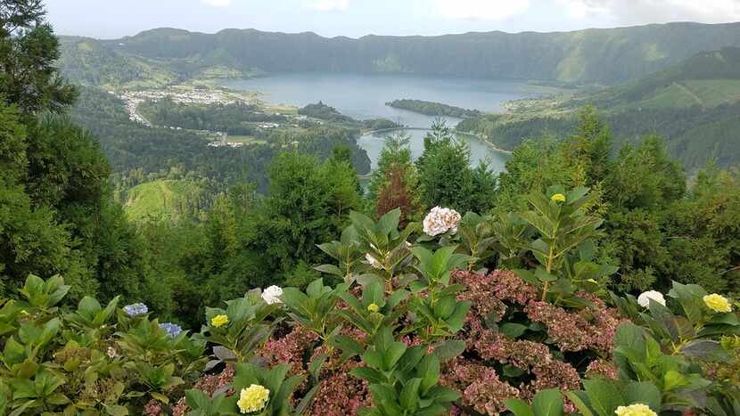 Sete Cidades, a three-mile-wide volcanic crater filled with lakes and a village, is the most...